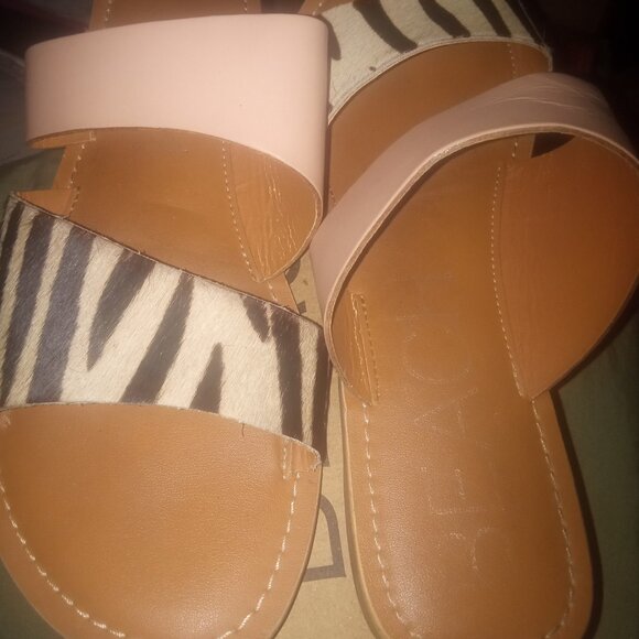 These Sleek Coastal Zebra/Cowhair Sandals are beautiful for any occasion! - Picture 1 of 4